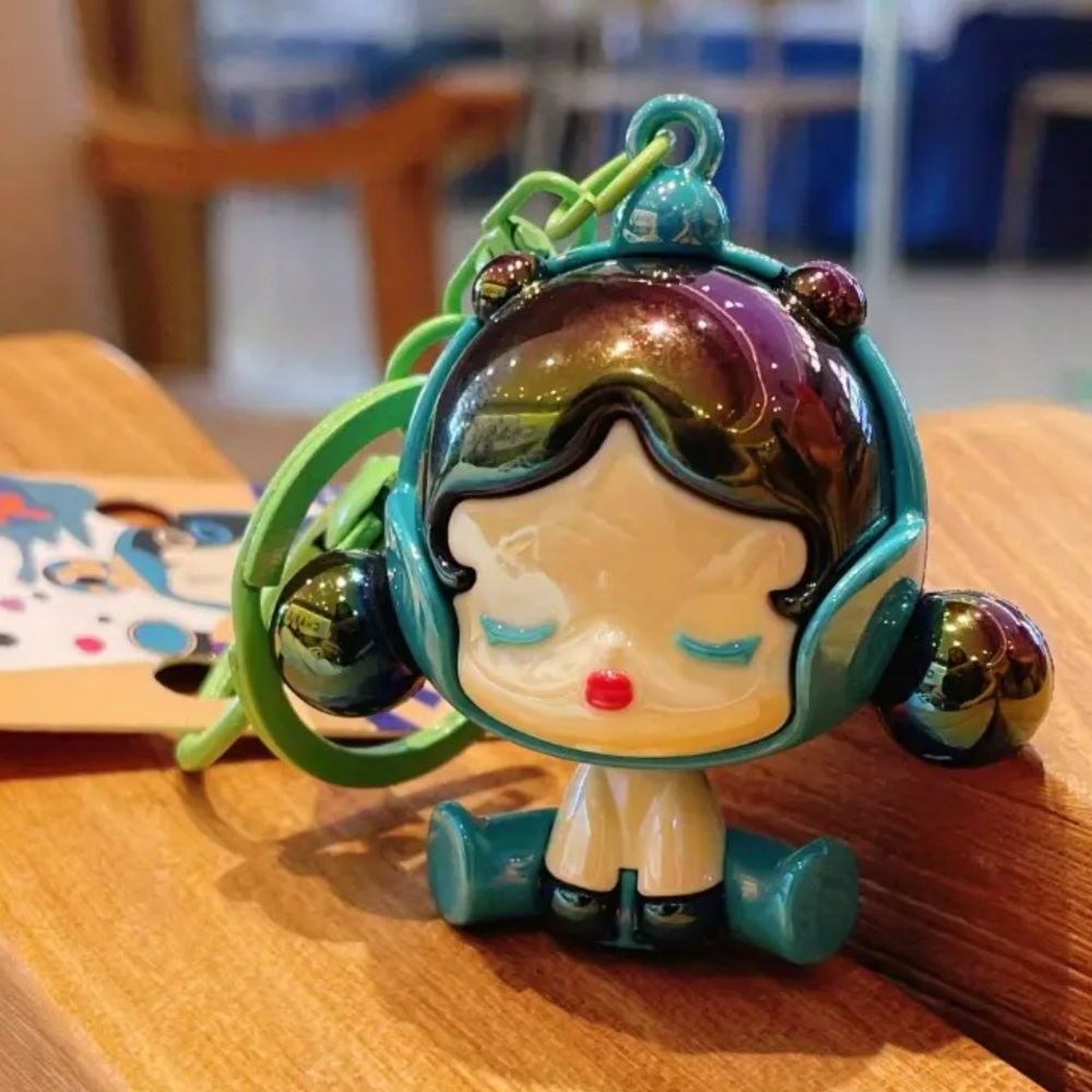 Electroplating Bubble Girl Green Variant Keychain 
NWOT